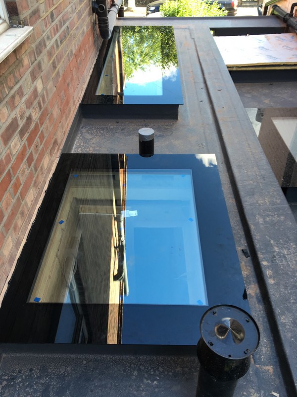 Multiple flat roof skylights on extension in Rickmansworth